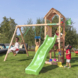 Speeltoestel Jungle Gym Cocoon met groene glijbaan en dubbele schommel van douglashout