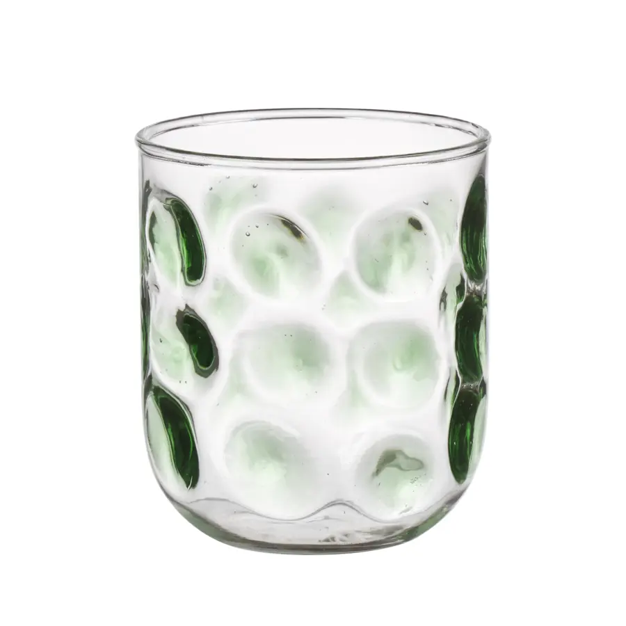 Glas met groene stippen